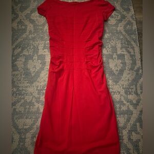 Red Escada ruched dress.